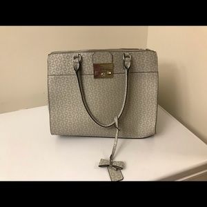 3 GUESS purses.